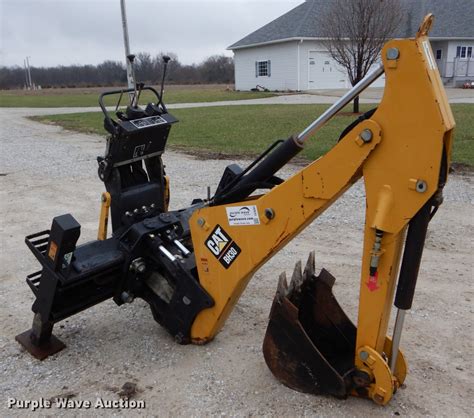 cat skid steer with backhoe attachment|caterpillar skid steer backhoe attachment.